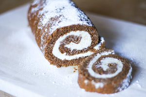 pumpkin roll sliced showing cream cheese swirl 