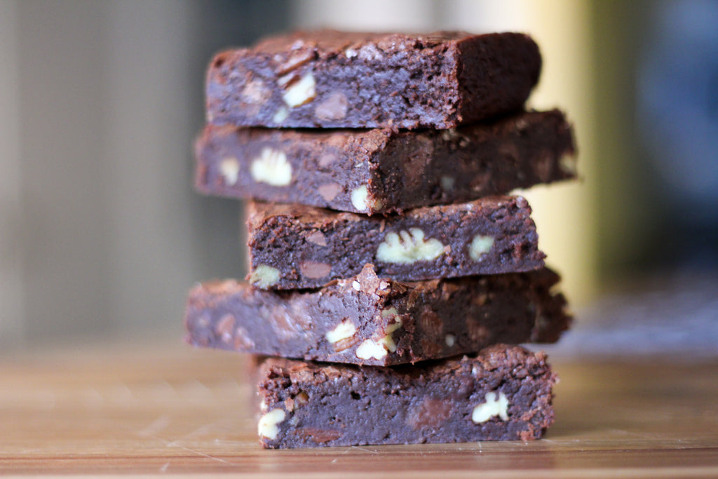 stack of 5 brownies with pecans